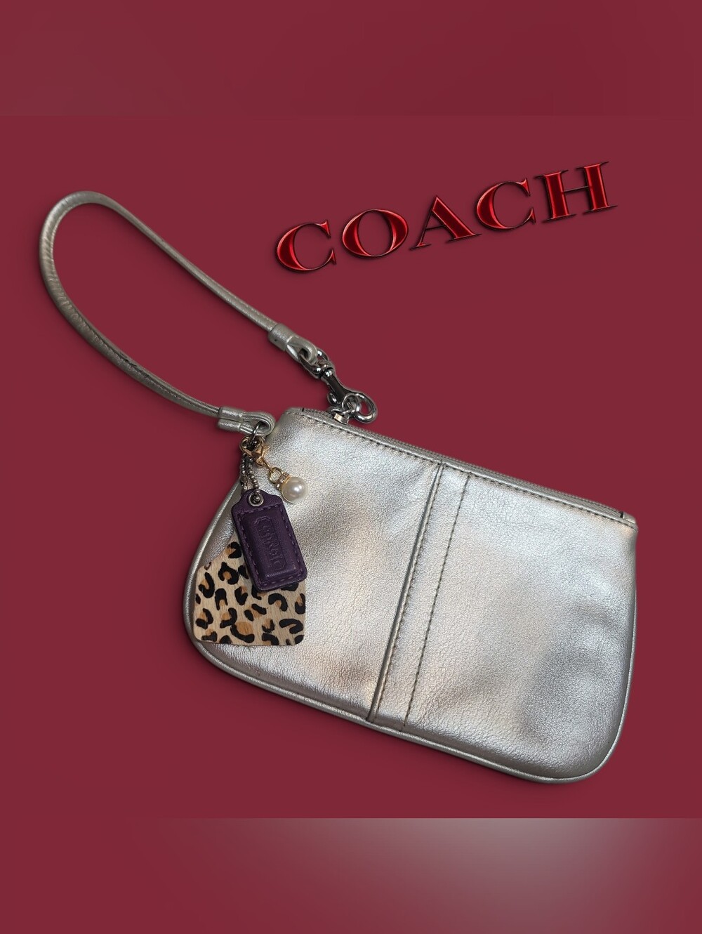 Coach Gold Metallic Leather Wristlet With Legacy Lining Has Small Spot On Back